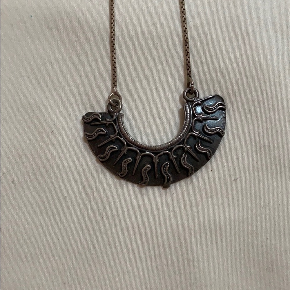 Silver sunburst antique necklace